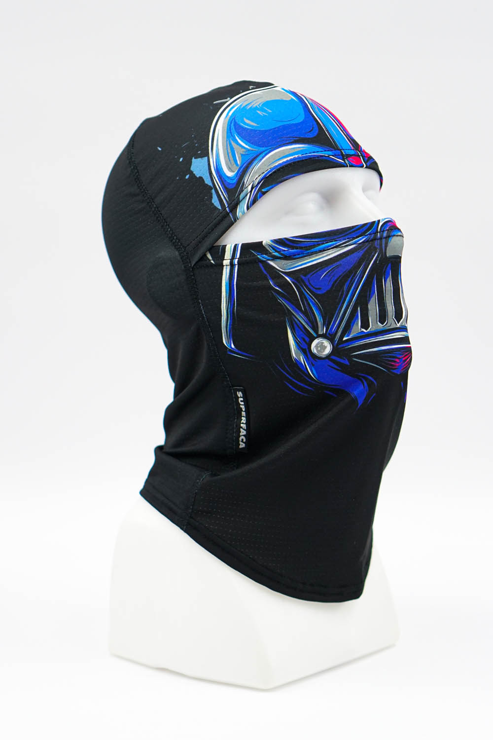 Black balaclava with blue and silver abstract design on a white mannequin head