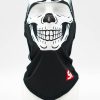 Mannequin head wearing a black balaclava with a white skull graphic covering the lower face.